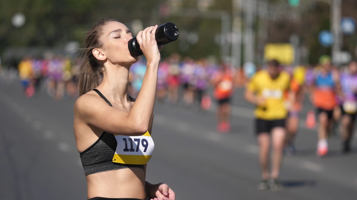 Woman,Athlete,Drink,Water,Bottle.,Thirsty,People,Run,Long,Distance.